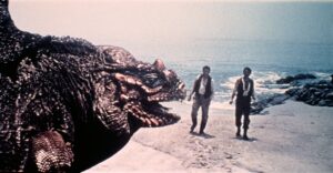 Two men confronted by a giant lizard