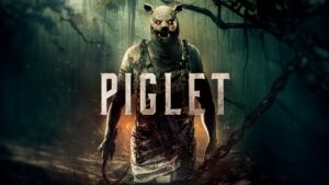 Stocky man wearing an apron and a pig mask