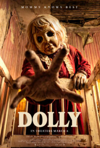 Person wearing a doll mask reaching forwards