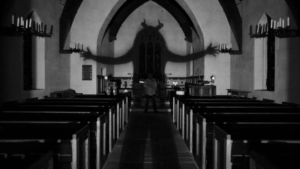 Shadow of a horned person filling up a church