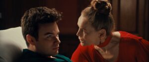 Younger man and older woman in conversation
