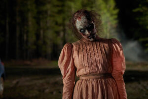 Scary looking woman outdoors